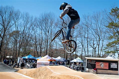 Ten-year-old Sully Youngblood looks for the ground while jumping on the Hardesty National BMX Stadium track on . . Nws bmx